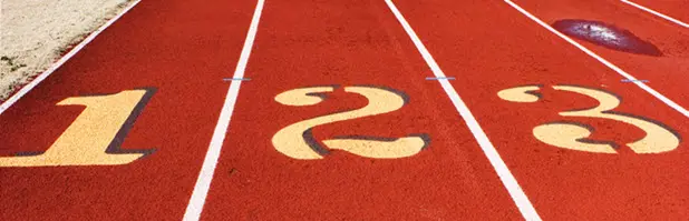 A racing track in red color with the numbers 123